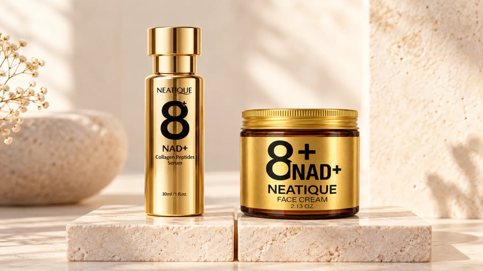Neatique NAD+ Serum and Face Cream on separate stone platforms with their front labels visible