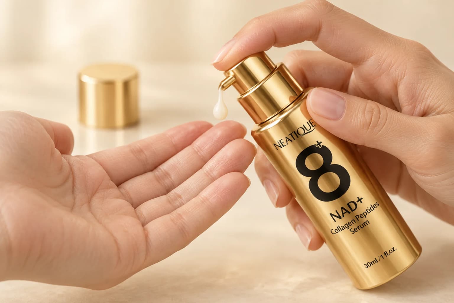 The current gold NAD+ Serum pump dispensing a small milky serum bead onto a clean palm. Editorial illustration; not a measured dose.