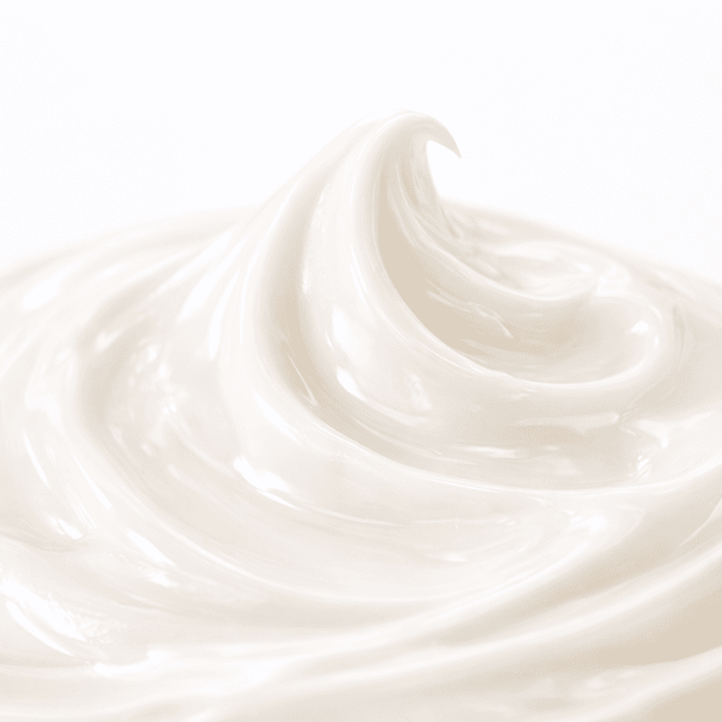 Silky white texture of Neatique AT13 arbutin and tranexamic acid cream