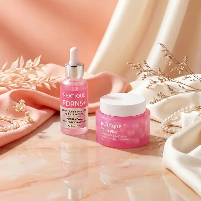 PDRN skincare products styled in a polished editorial still life.